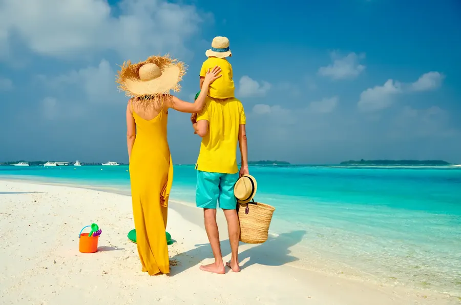 A family with a small boy on a beach
